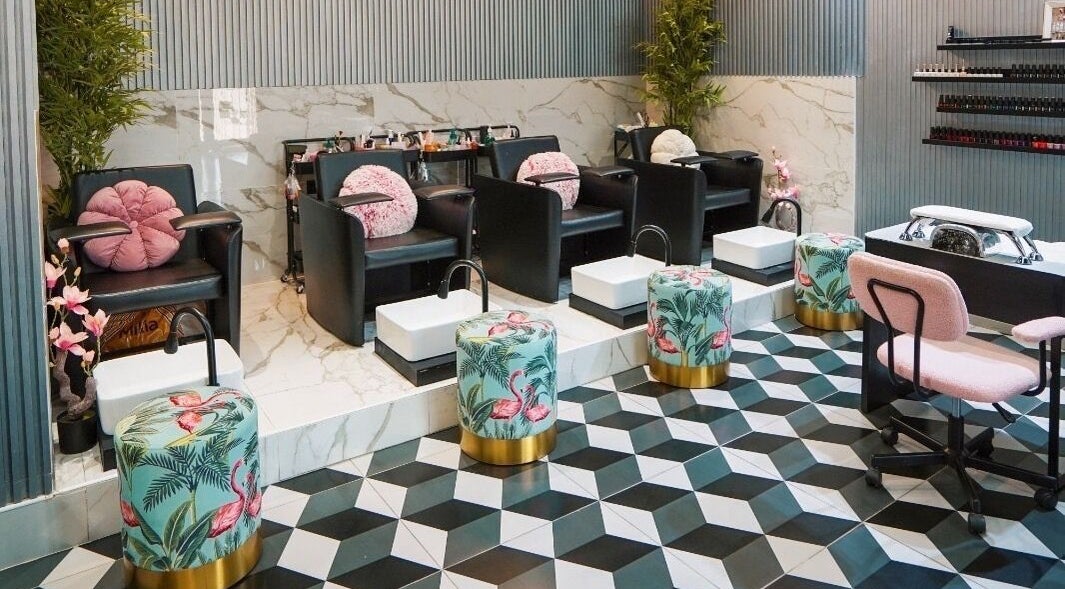 Vog Beauty Salon For Ladies in دبي, دبي, AE, featuring chic pedicure chairs with flamingo decor.