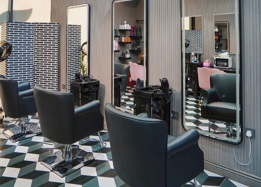 Elegant chairs and mirrors at Vog Beauty Salon For Ladies, دبي, دبي, AE, showcasing modern salon sophistication.