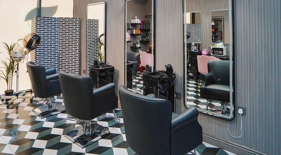 Elegant chairs and mirrors at Vog Beauty Salon For Ladies, دبي, دبي, AE, showcasing modern salon sophistication.