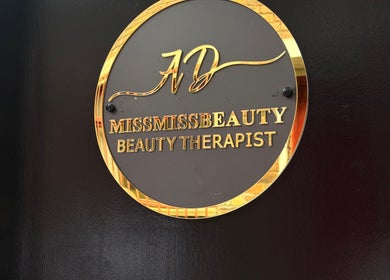 Gold plaque of Miss Miss Beauty, a beauty therapist in Cambuslang, Scotland, GB.