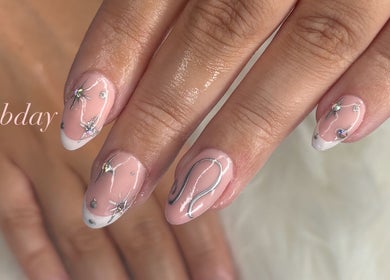 Intricate nail art design at Miss Miss Beauty in Cambuslang, Scotland, GB.