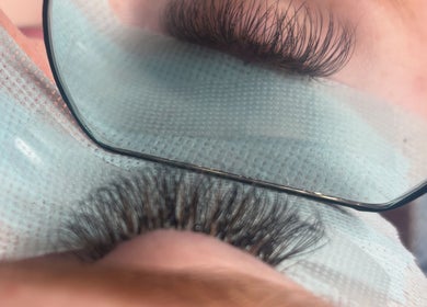 Eyelash extensions reflected in a mirror at Miss Miss Beauty, Cambuslang, Scotland, GB.
