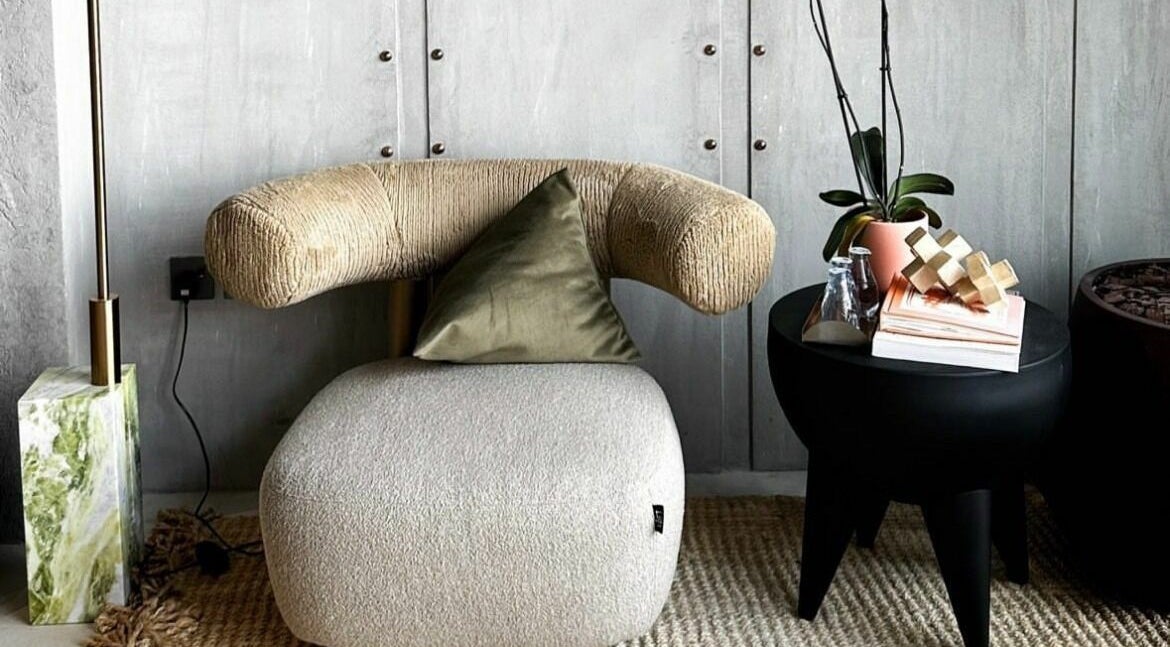 Inviting lounge area at Dry by Spa, Riyadh, SA, showcasing modern chair and chic decor.