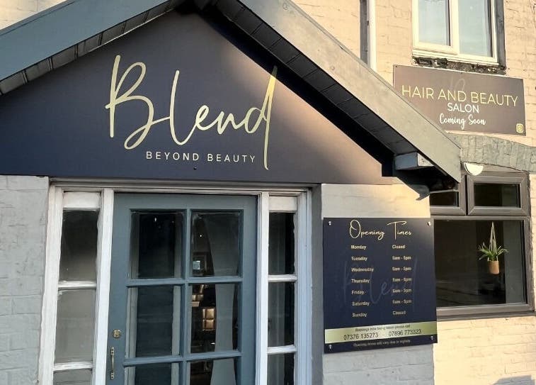 Exterior of Blend Beyond Beauty salon, Baldwin's Gate, England, GB, showcasing modern signage and style.