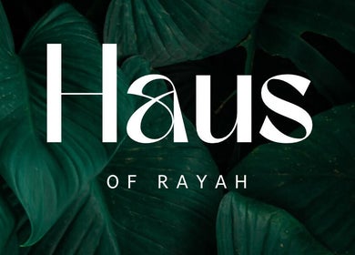 Haus of Rayah logo over lush green leaves in Prestwich, England, GB.