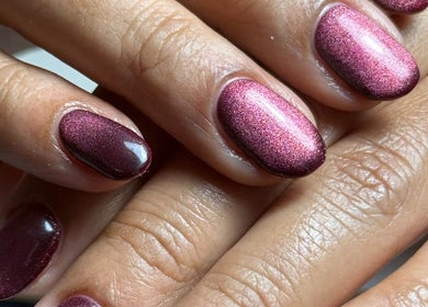 Close-up of elegant maroon gel nails at Haus of Rayah, Prestwich, England, GB.