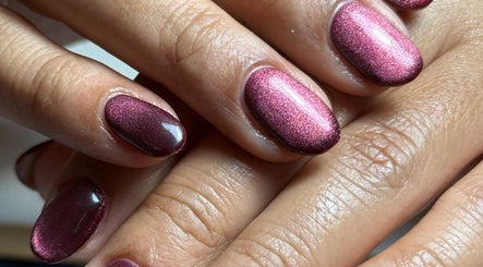 Close-up of elegant maroon gel nails at Haus of Rayah, Prestwich, England, GB.