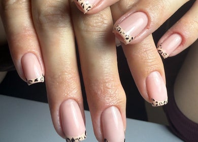 Elegant leopard print nail art at Haus of Rayah, Prestwich, England, GB, showcasing creativity and style.