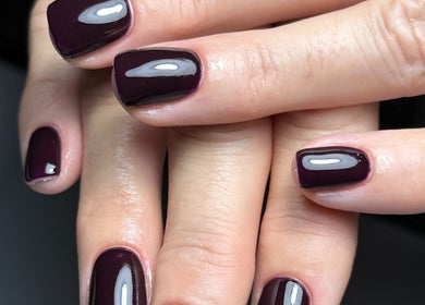 Elegant aubergine-colored nails with a glossy finish at Haus of Rayah, Prestwich, England, GB.