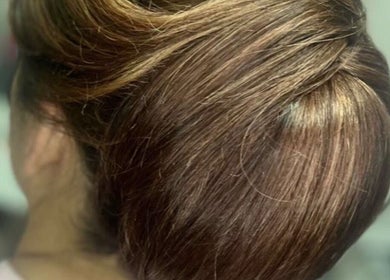 Stylish updo hairstyle at Atelier, Stockton-on-Tees, England, GB, showcasing expert hair design.