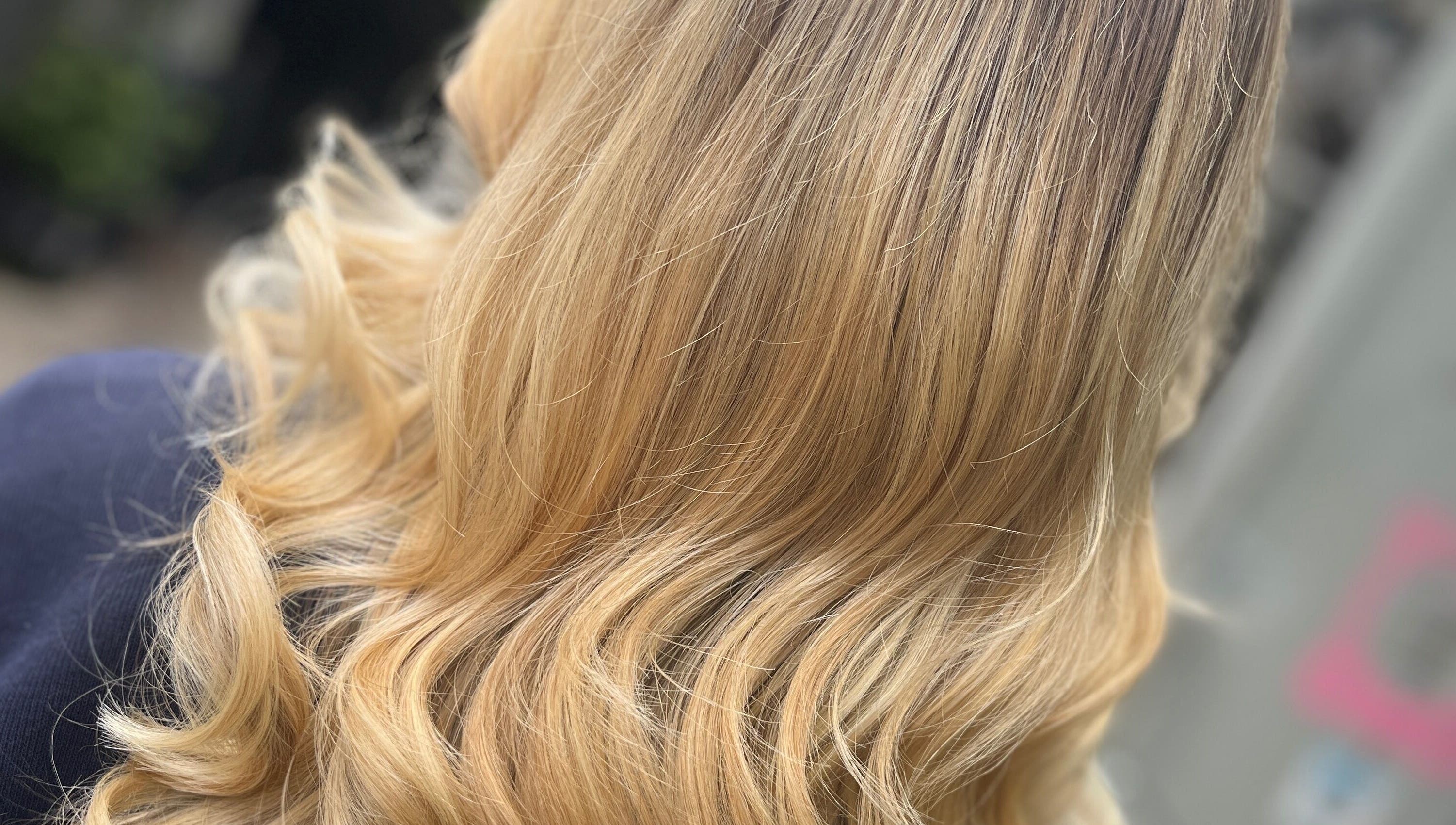 Elegant blonde curls styled at Taryn Lee Hairdressing, Johannesburg, Gauteng, ZA.