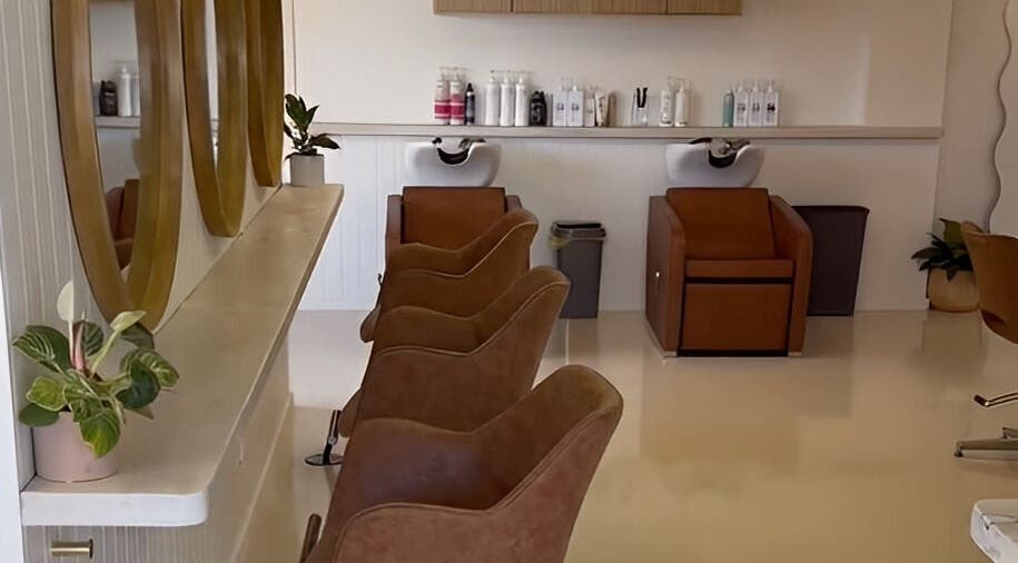 Modern salon chairs and mirrors at La Chay Studio, Mansfield, Victoria, AU offering a tranquil experience.