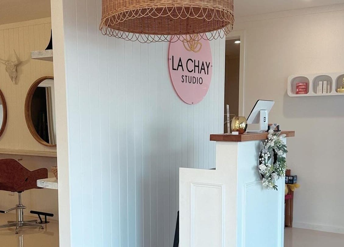 Welcoming reception area at La Chay Studio, Mansfield, Victoria, AU with elegant decor and stylish mirrors.