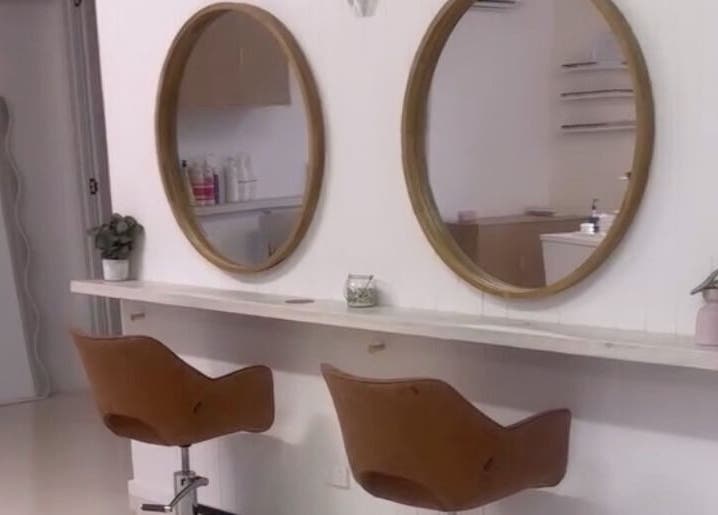 Elegant salon setup at La Chay Studio, Mansfield, Victoria, AU featuring dual round mirrors.