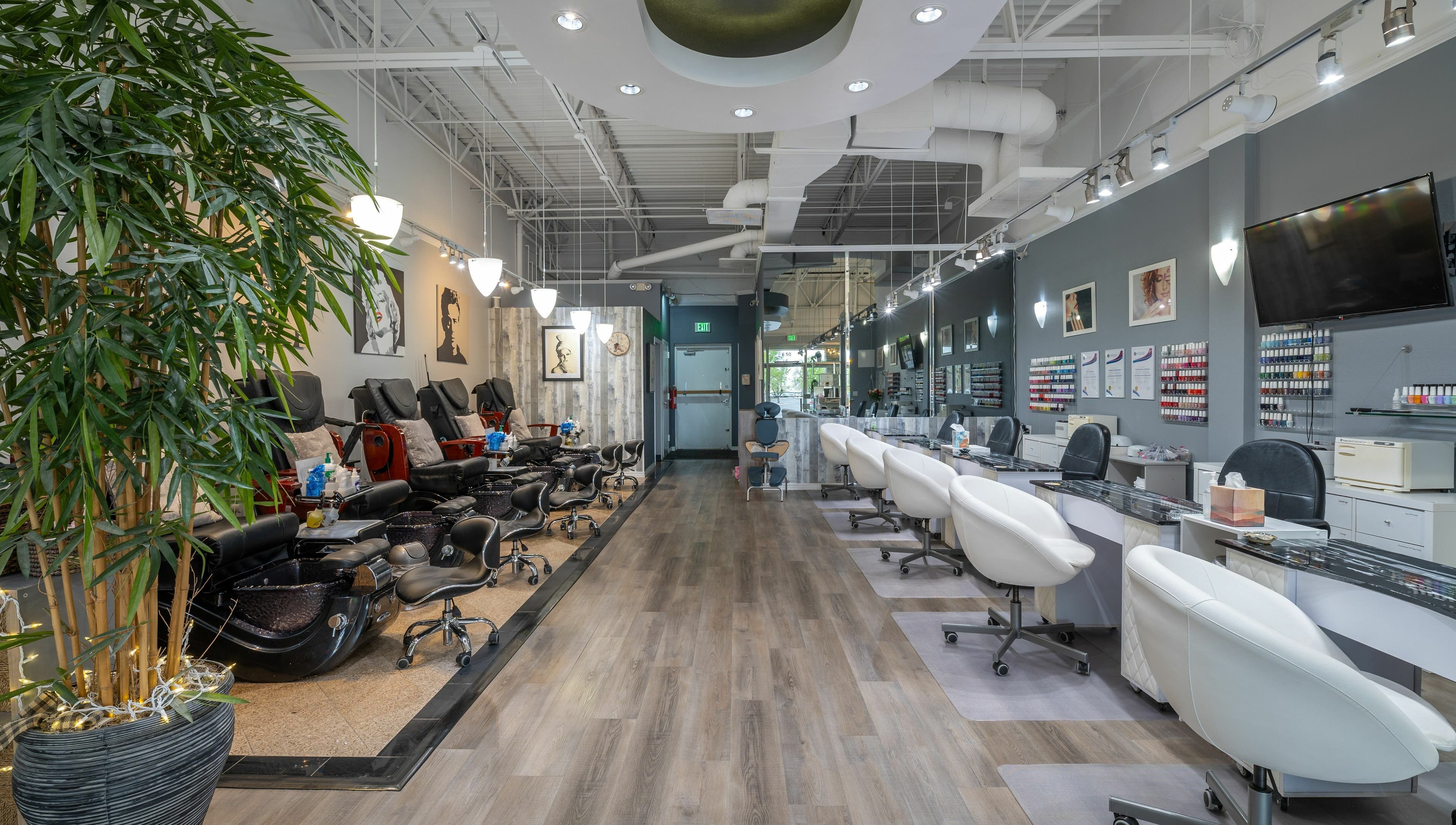 Modern interior of Etoile Salon - Advanced Nail Care & Beauty Boutique in Denver, Colorado, US with stylish seating.