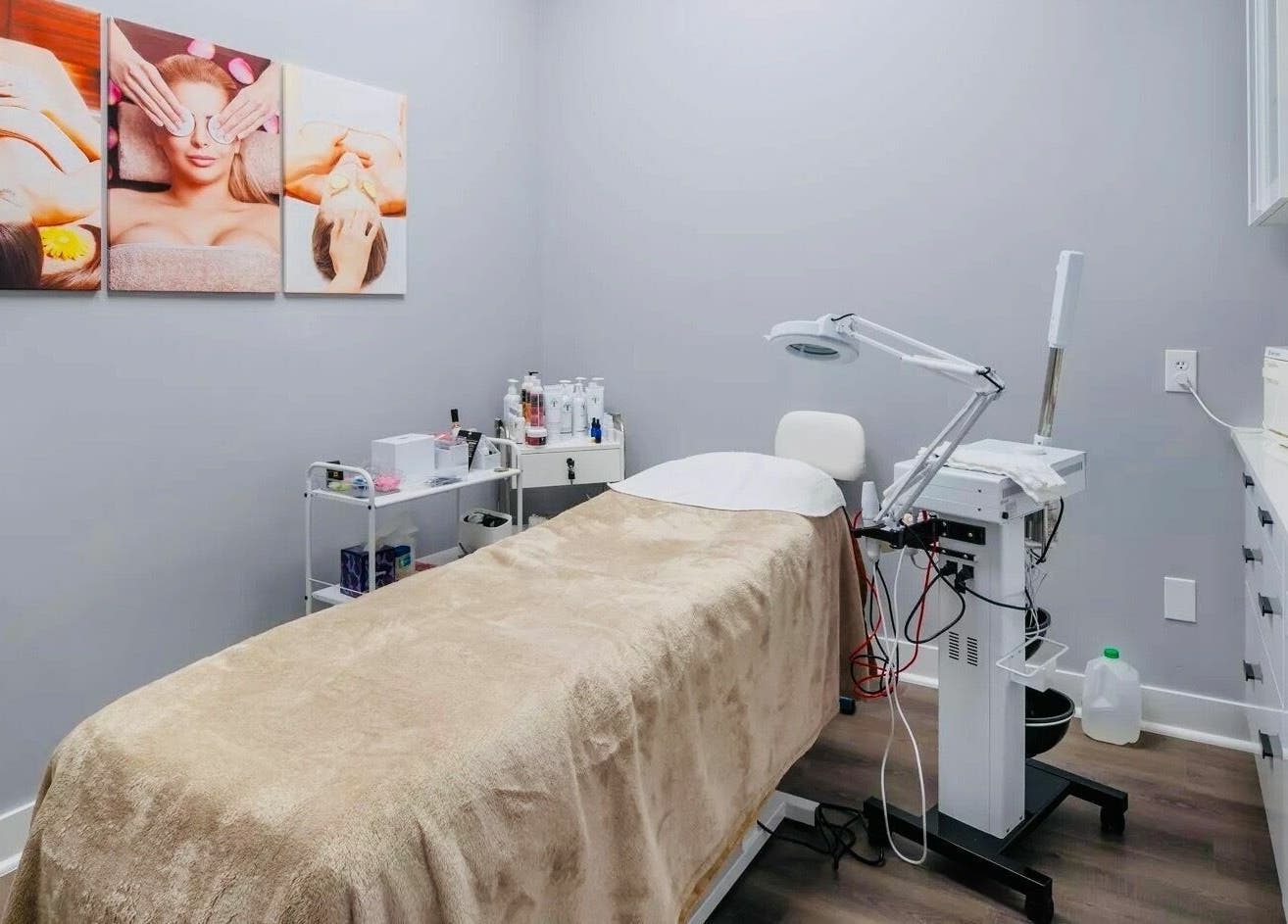 Etoile Salon - Advanced Nail Care & Beauty Boutique in Denver, Colorado, features a serene treatment room with spa photos.