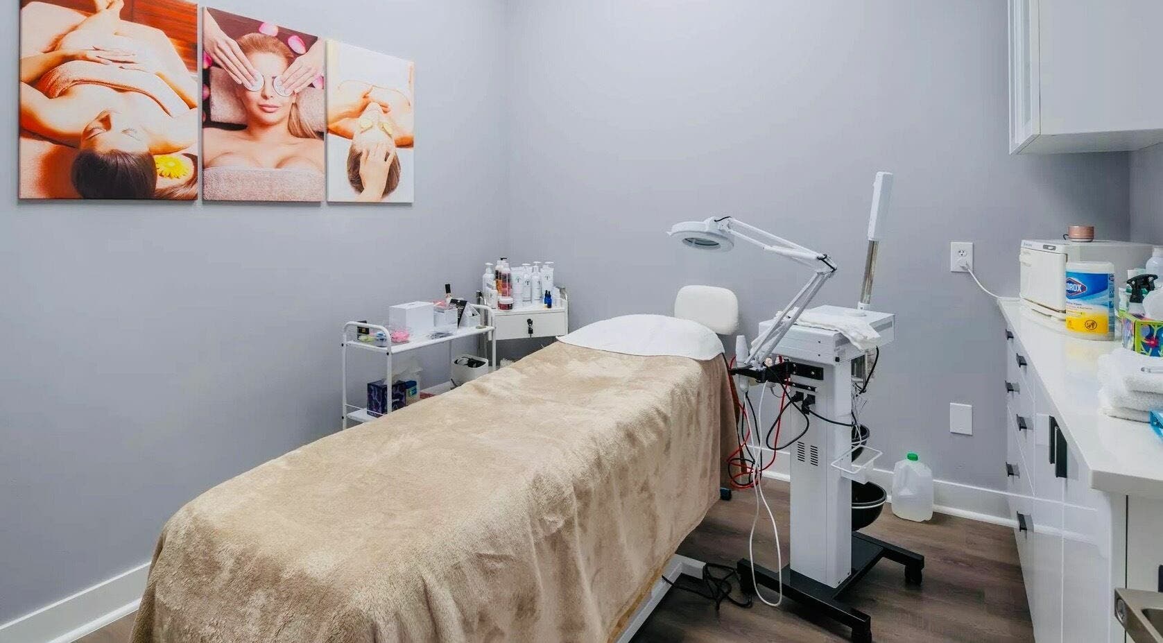 Etoile Salon - Advanced Nail Care & Beauty Boutique in Denver, Colorado, features a serene treatment room with spa photos.