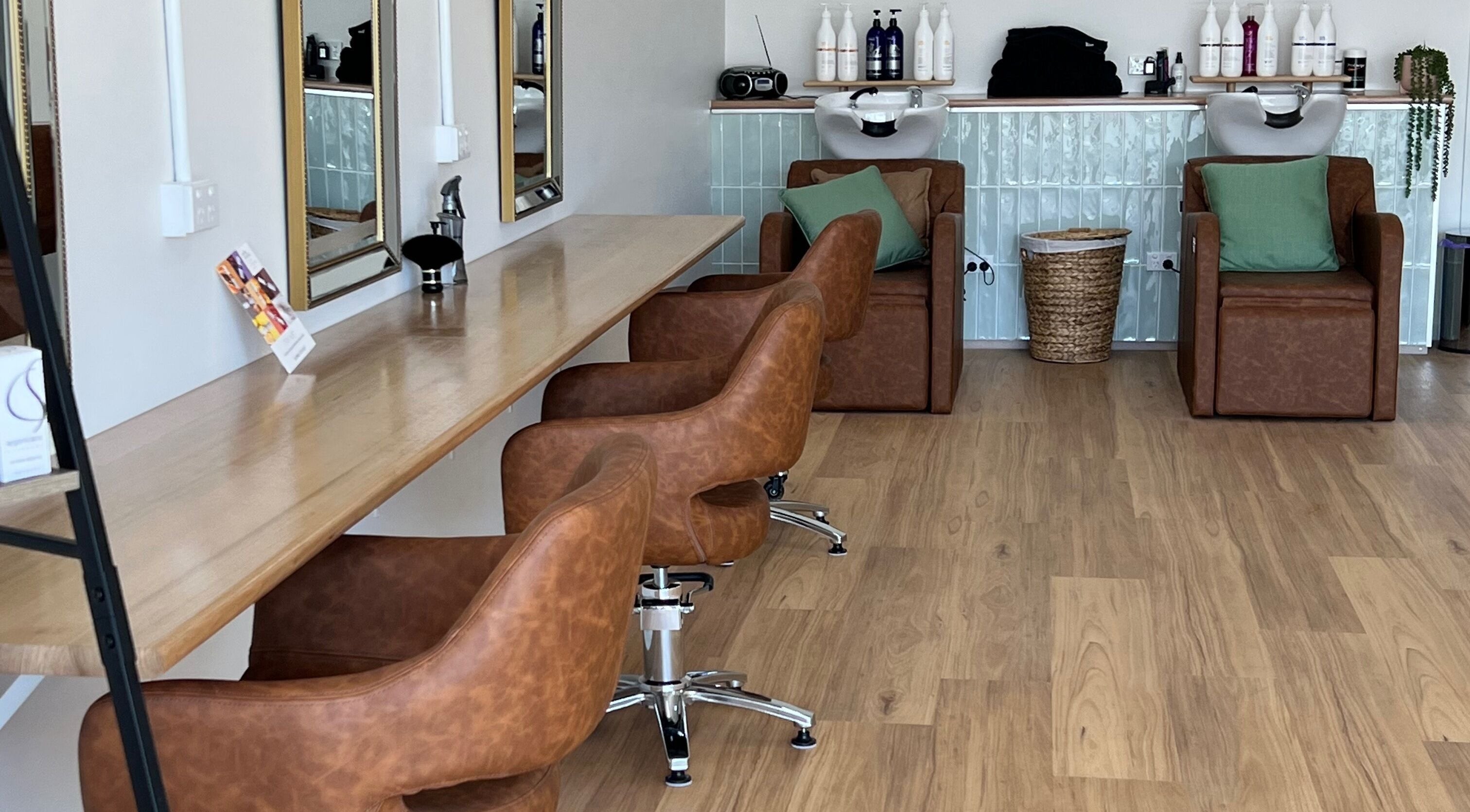 Elegant salon interior with stylish chairs at Hilltop Hair and Beauty, Longwarry, Victoria, AU.