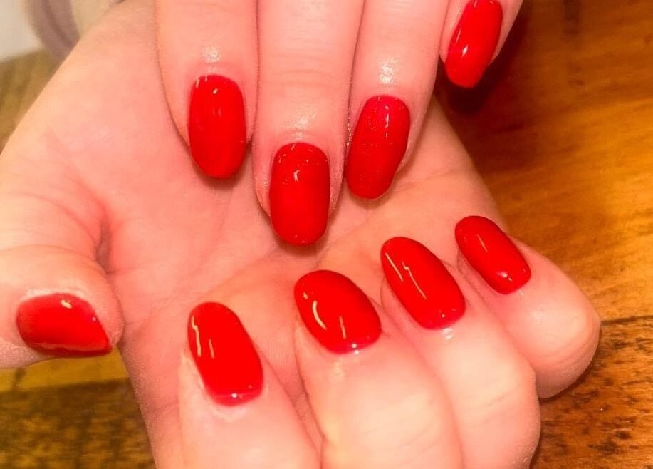 Vibrant red nails at Jessica Jay Salon, Perth, Scotland, GB showcase elegance and style.
