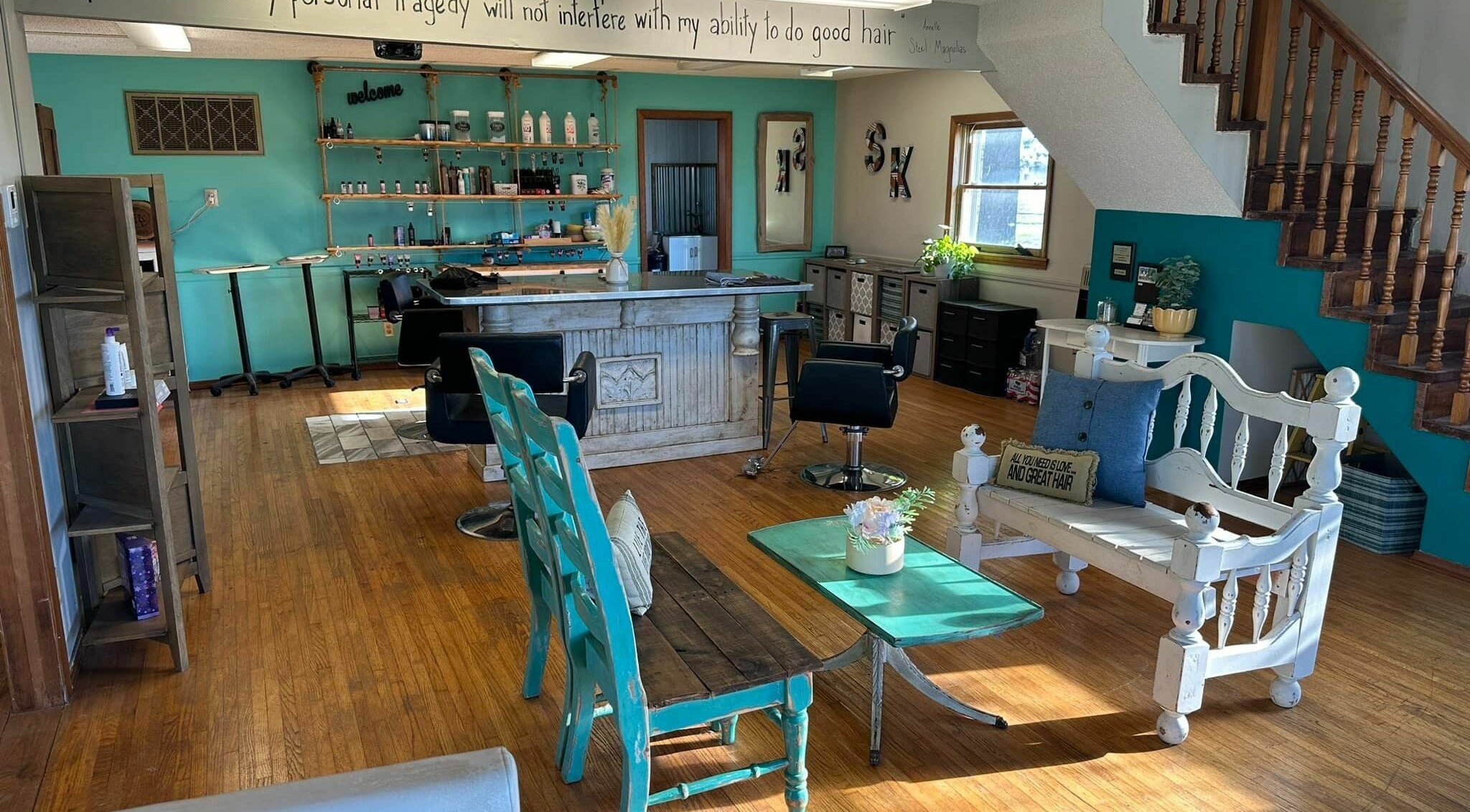 Cozy interior of Salon Knot in Rogersville, Missouri, US, featuring stylish wooden decor and vibrant accents.