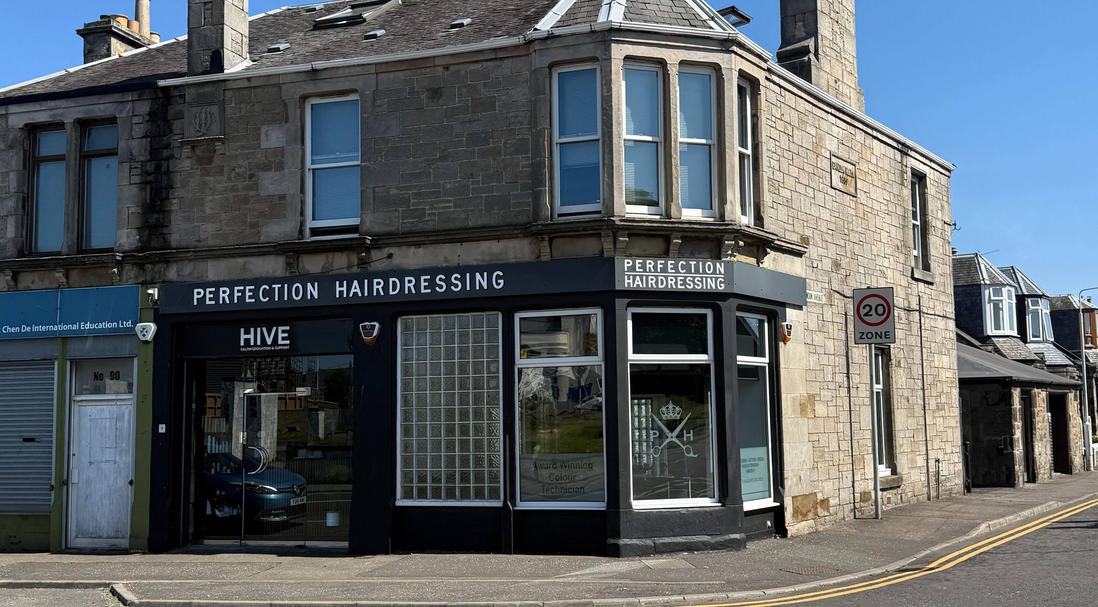 Exterior of Perfection Hairdressing in Kirkcaldy, Scotland, GB, showcasing its welcoming facade.