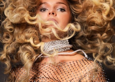 Elegant hairstyle with flowing curls at Studio 2 Brighton, Brighton And Hove, England, GB.