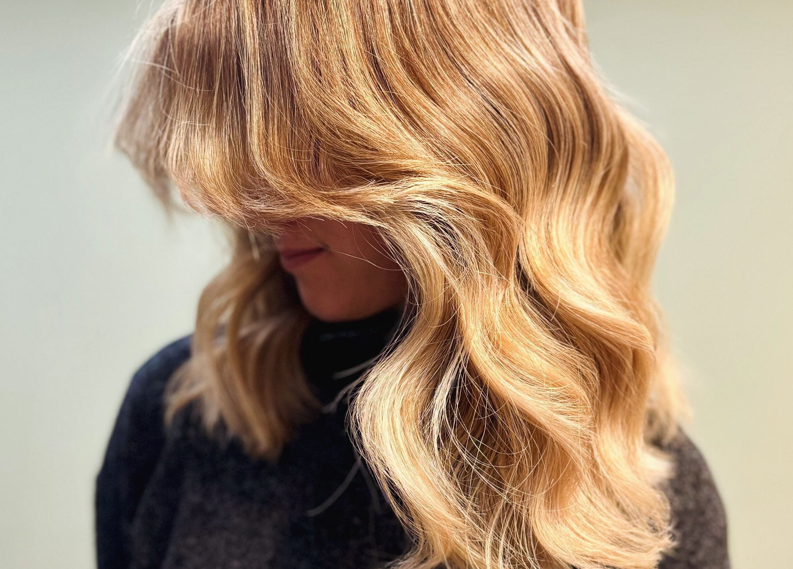 Stylish blonde waves hairstyle at Studio 2 Brighton, Brighton And Hove, England, GB.