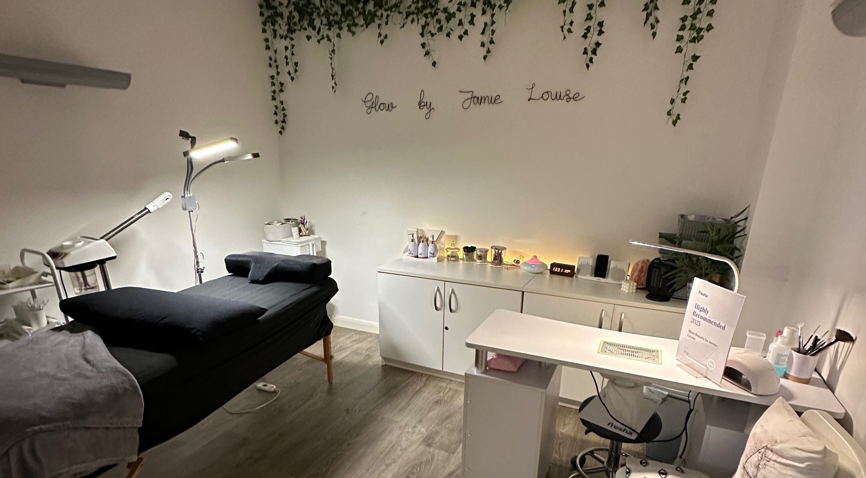 Cozy treatment room at Glow Beauty by Jamie-Louise in Portslade, England, GB with a massage bed and calming decor.