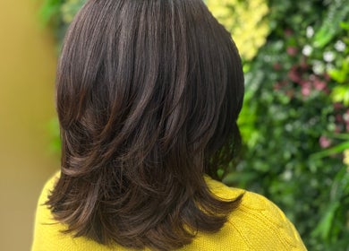 Elegant layered hairstyle at Gayatri Beauty Clinic, Leicester, England, GB.