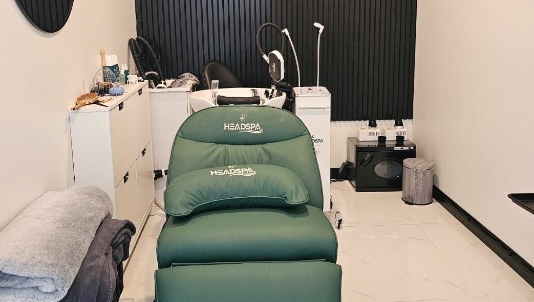 Luxurious salon suite at Ombré Terrace ™, Torrance, California, US, featuring a sleek spa chair and modern decor.