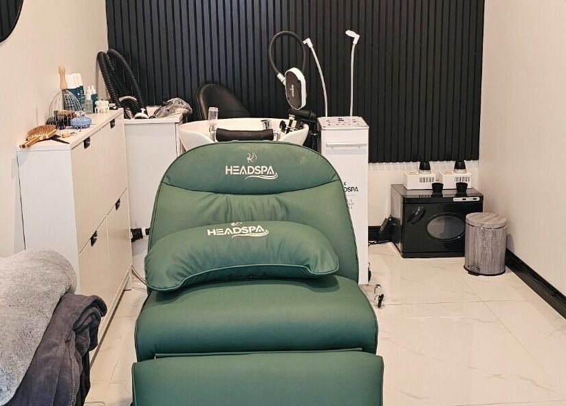 Luxurious salon suite at Ombré Terrace ™, Torrance, California, US, featuring a sleek spa chair and modern decor.