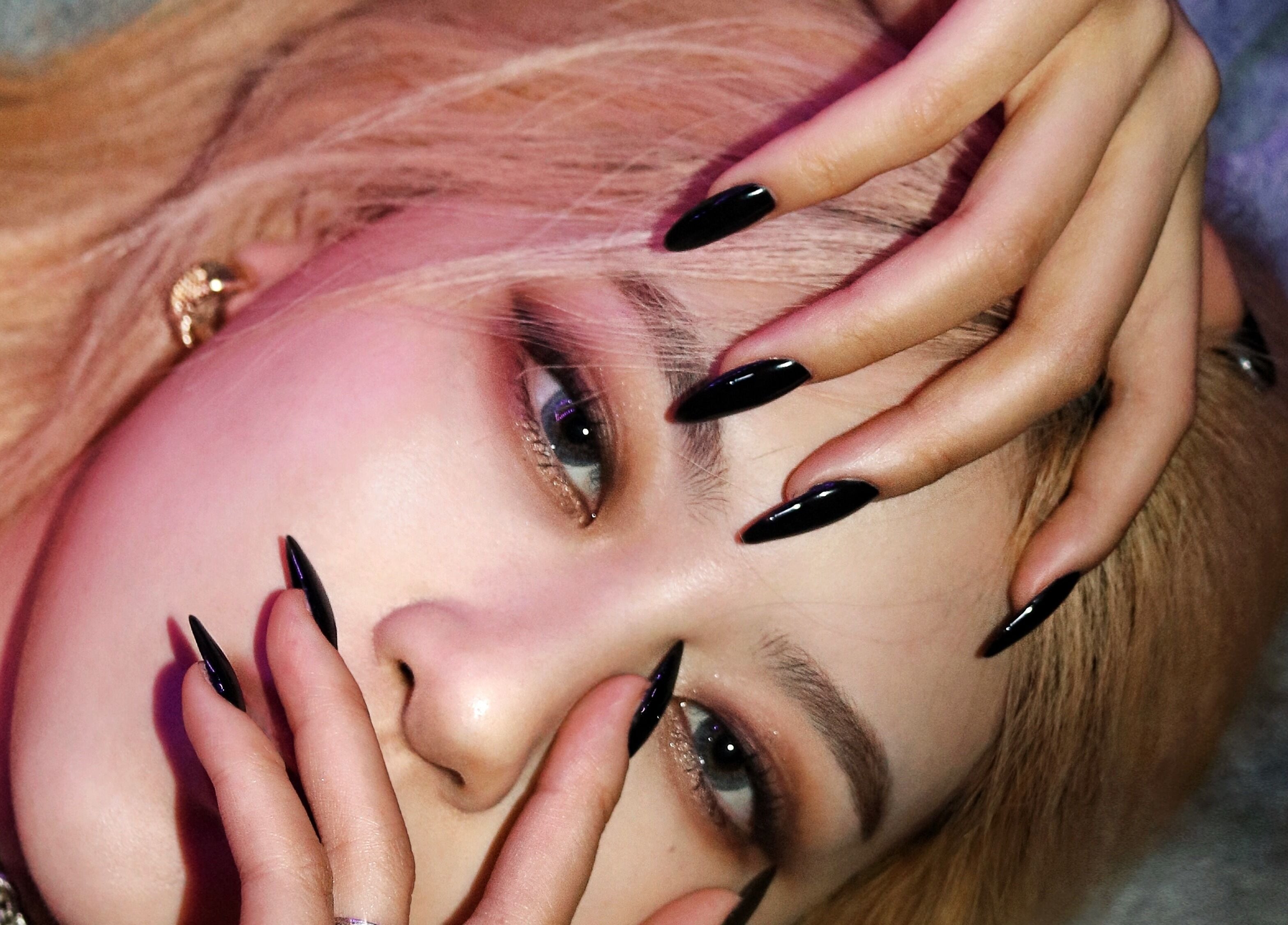 Elegant eye makeup with black nails at Ombré Terrace ™, Torrance, California, US.