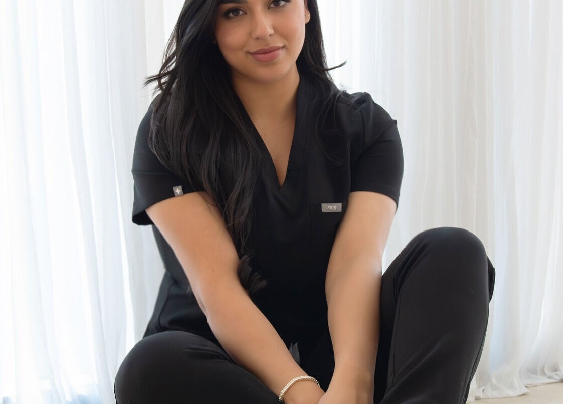 Relaxed ambiance at By The ML Aesthetics, Putney, New South Wales, AU with professional in black attire.