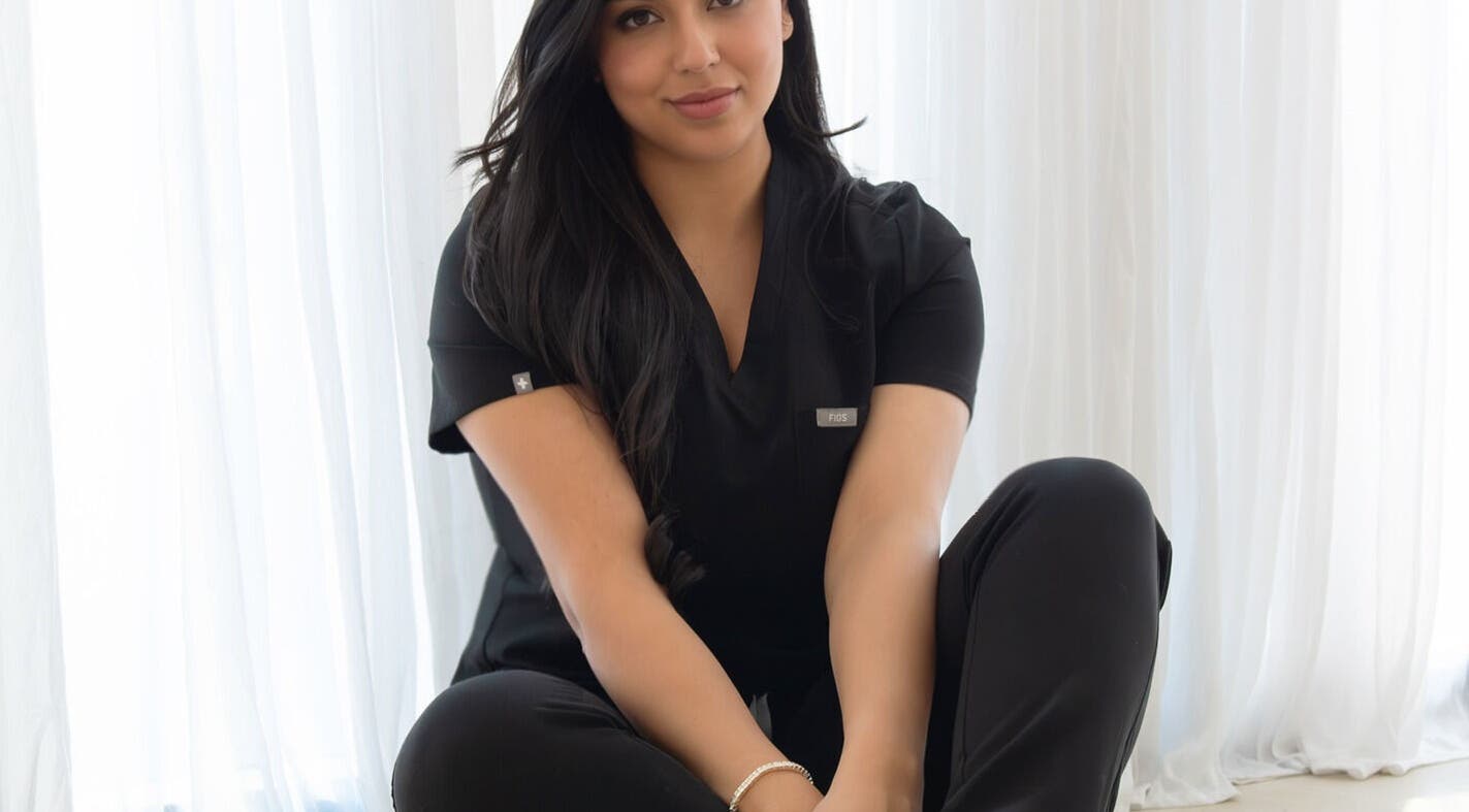 Relaxed ambiance at By The ML Aesthetics, Putney, New South Wales, AU with professional in black attire.