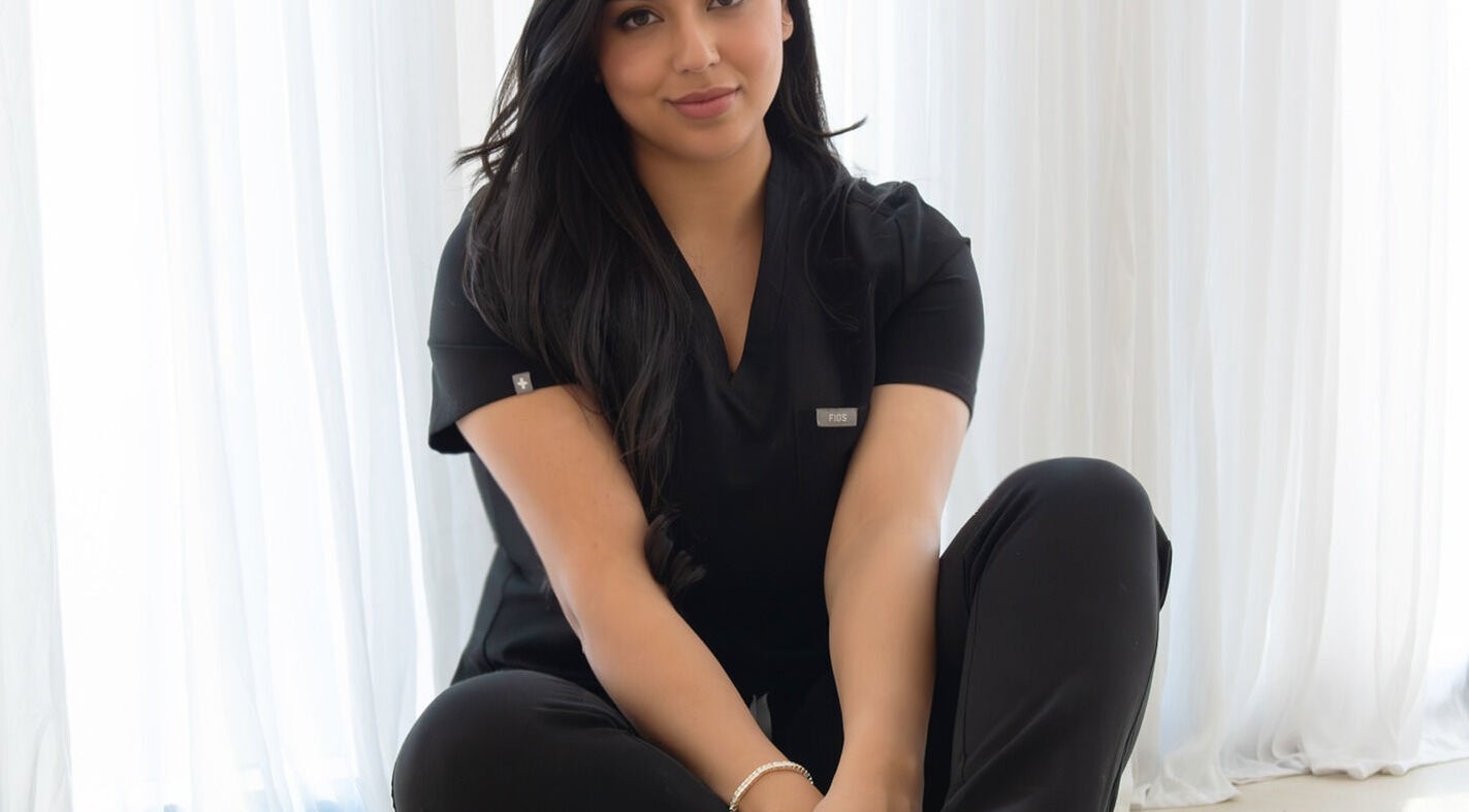 Relaxed ambiance at By The ML Aesthetics, Putney, New South Wales, AU with professional in black attire.