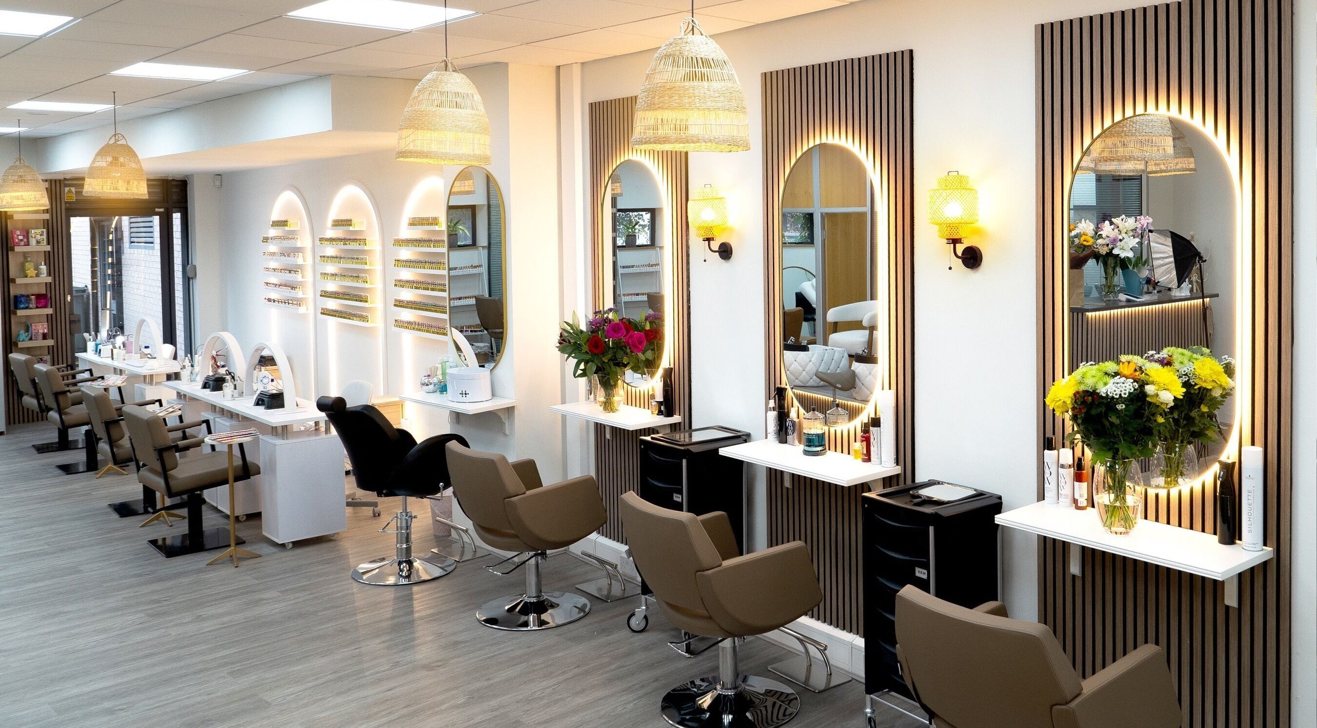 Contemporary and stylish interior of Misha & Eti Beauty Studio in Manchester, England, GB with floral accents.