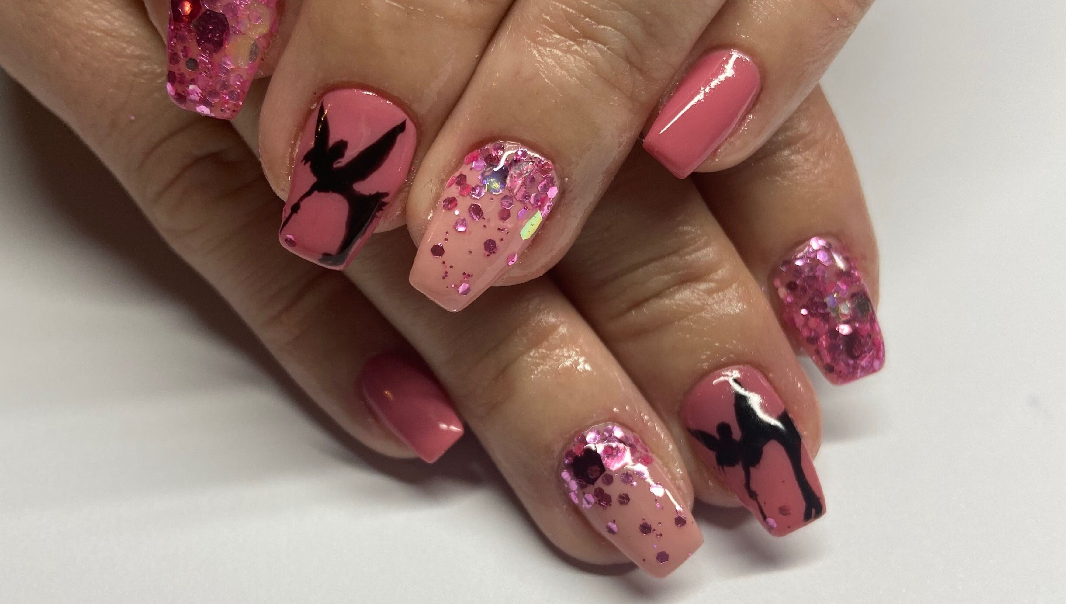 Elegant pink nails with art at Shines Nail Art, Klerksdorp, North West, ZA. Featuring glitter and intricate designs.