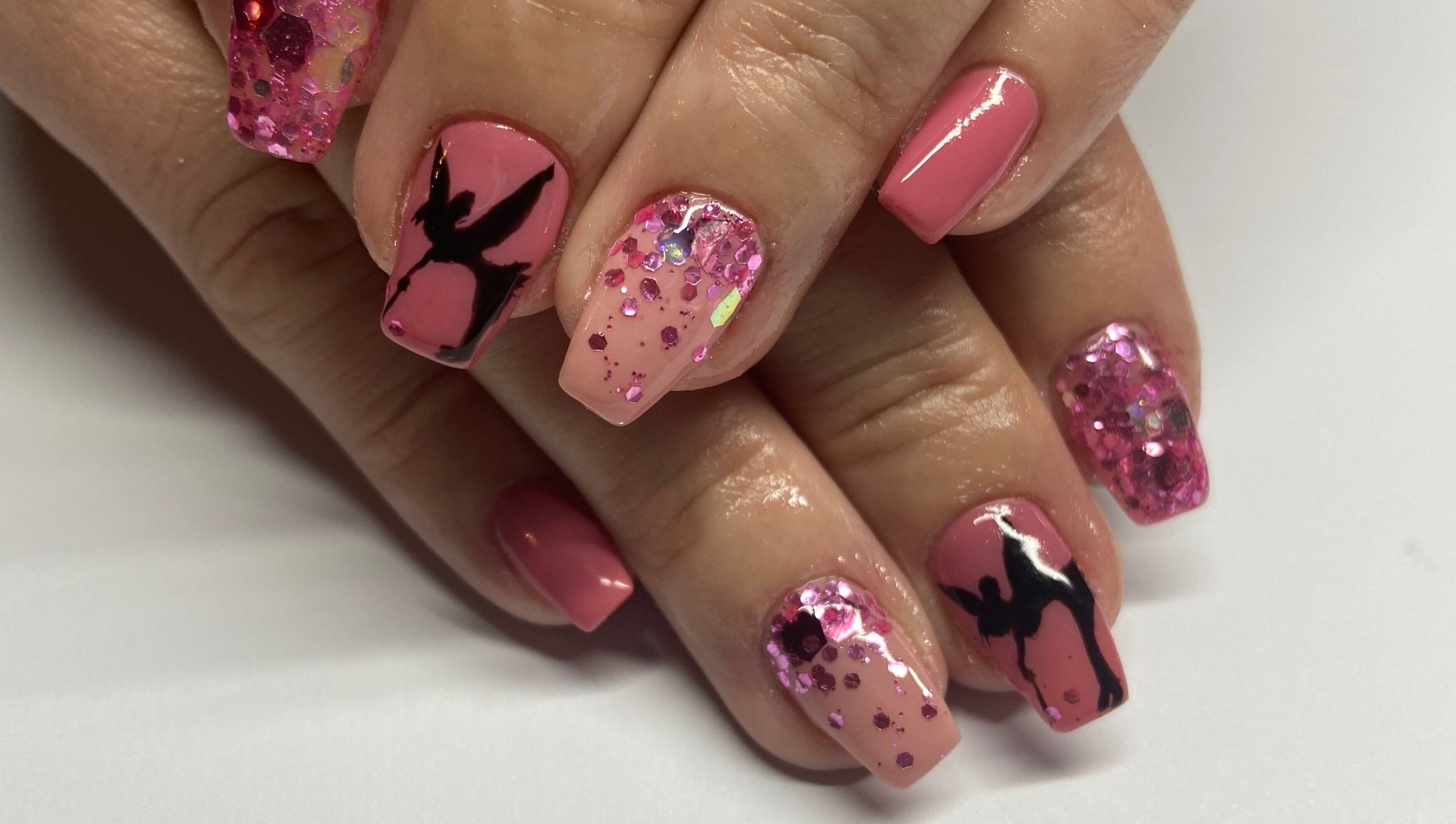 Elegant pink nails with art at Shines Nail Art, Klerksdorp, North West, ZA. Featuring glitter and intricate designs.