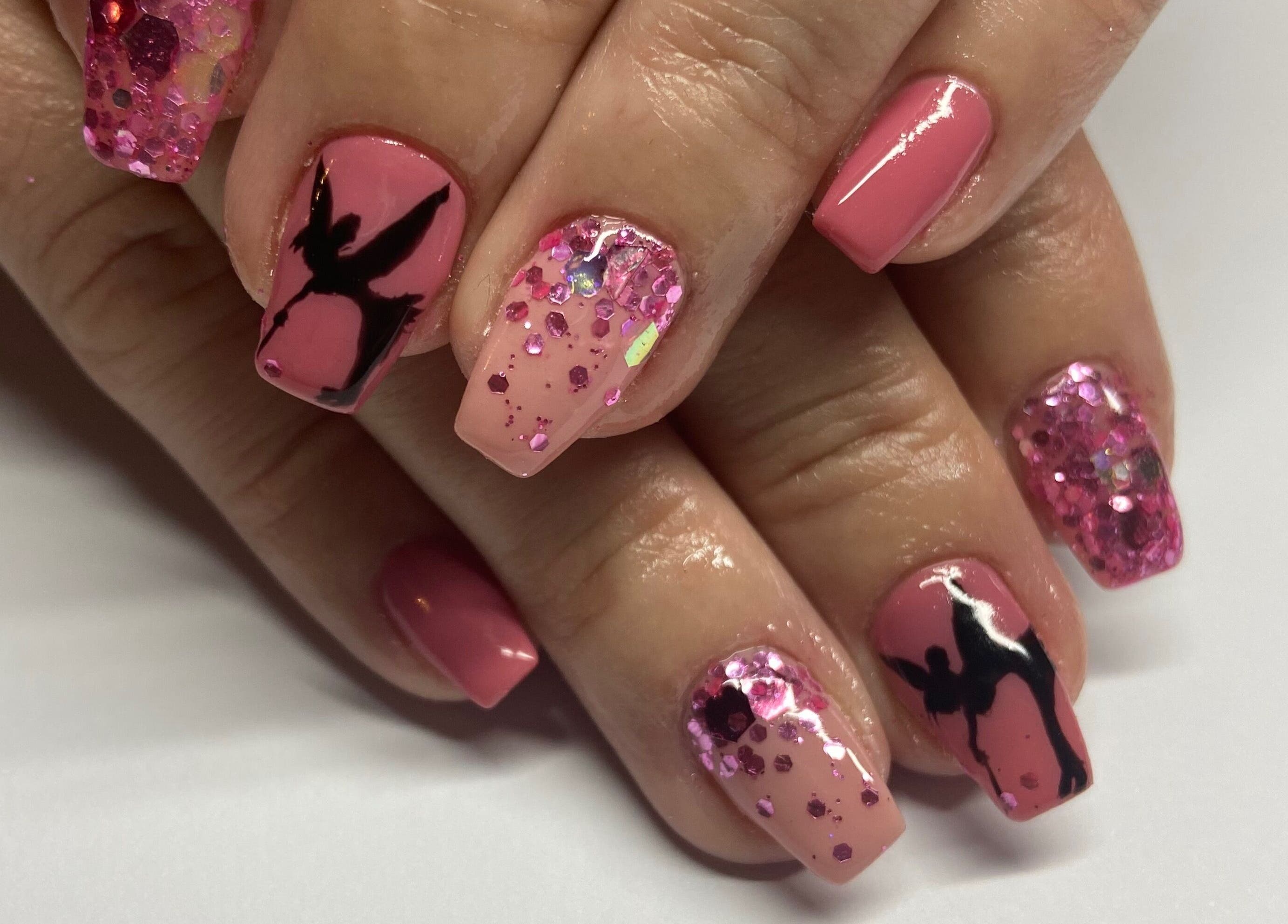 Elegant pink nails with art at Shines Nail Art, Klerksdorp, North West, ZA. Featuring glitter and intricate designs.