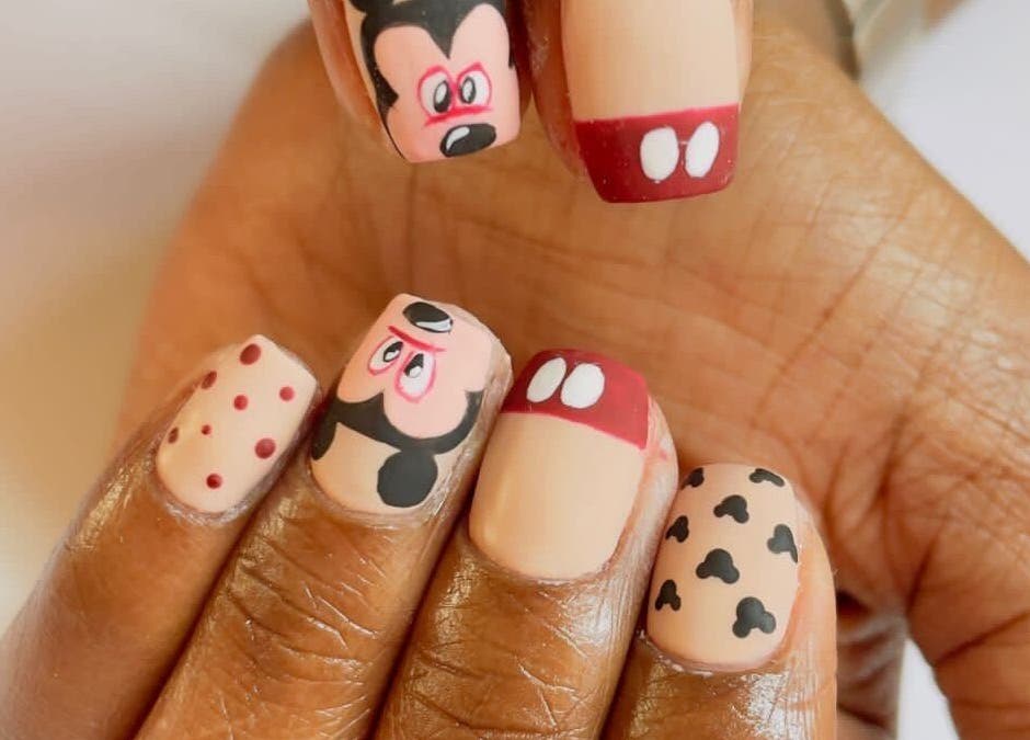 Mickey-themed nails at Shines Nail Art, Klerksdorp, North West, ZA. Fun and creative nail designs on display.