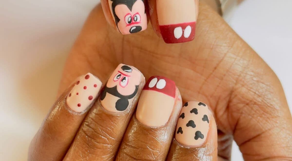 Mickey-themed nails at Shines Nail Art, Klerksdorp, North West, ZA. Fun and creative nail designs on display.