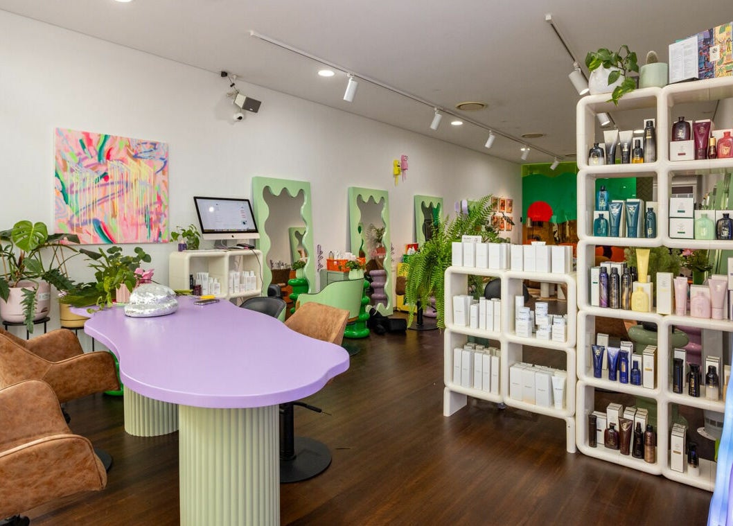 Stylish interior of Dollie and Stella beauty salon in Sydney, Australia, AU featuring vibrant decor and beauty products.