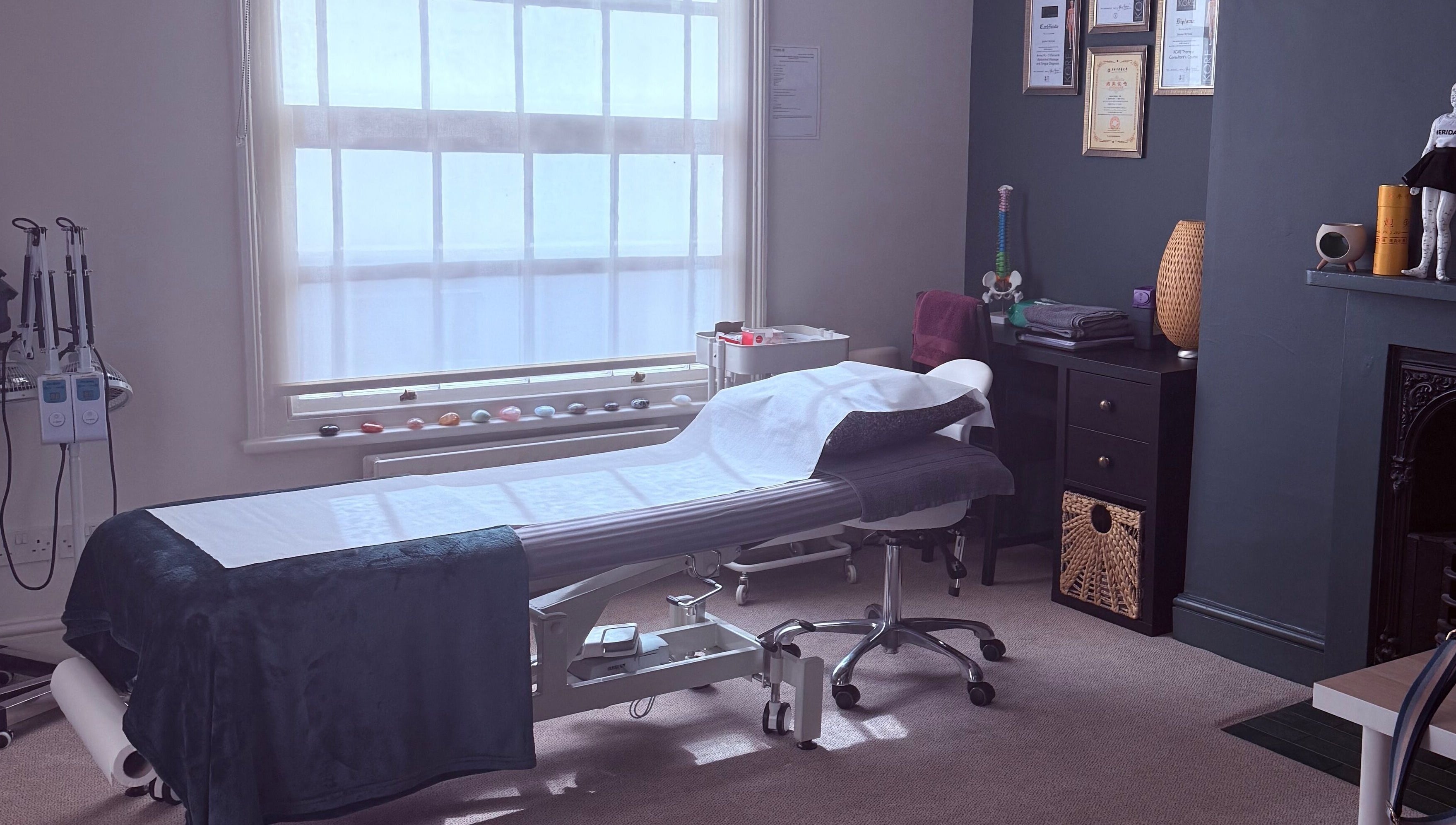 Therapy room at Seeking Stillness Gravesend, featuring a massage bed and calming decor in Gravesend, England, GB.