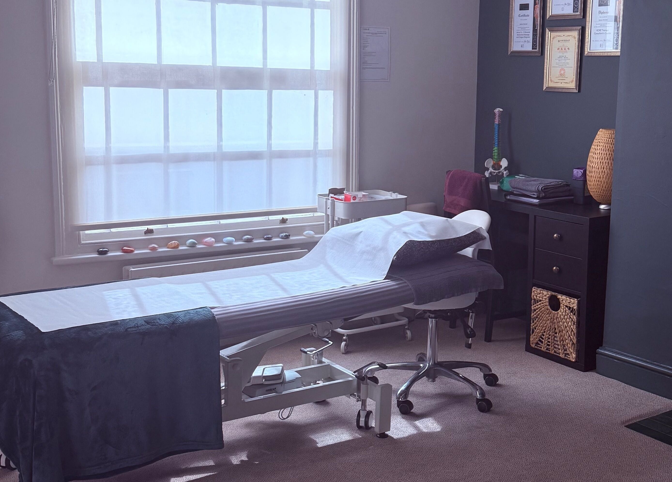 Therapy room at Seeking Stillness Gravesend, featuring a massage bed and calming decor in Gravesend, England, GB.