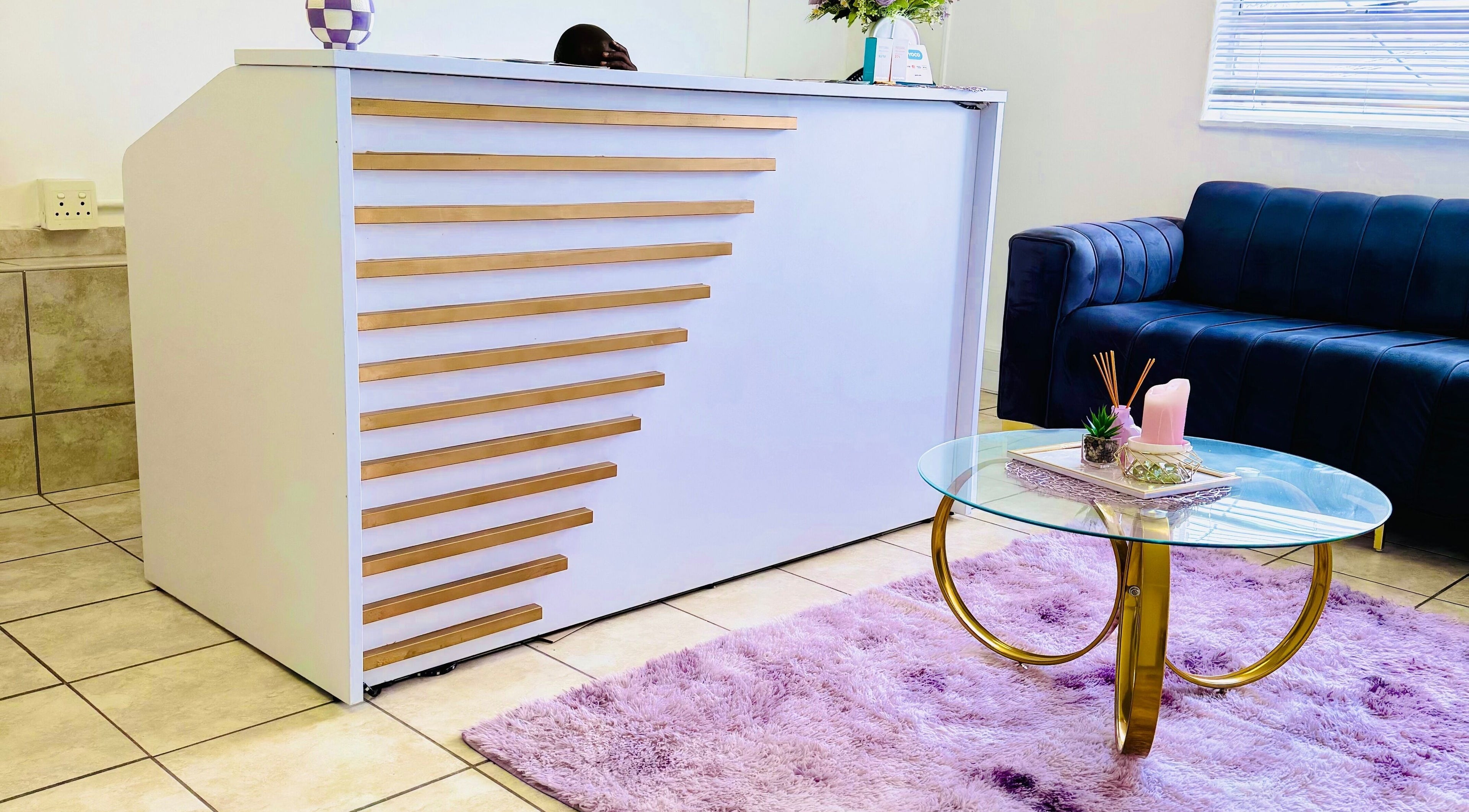 Chic reception area at Glam Skin Aesthetic Clinic, Pretoria, Gauteng, ZA with stylish decor and cozy seating.