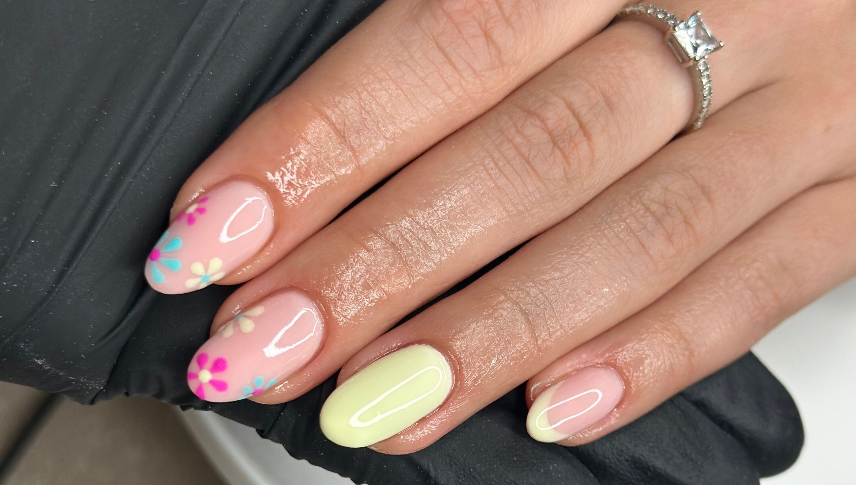 Floral nail art manicure at Livin Beauty Lounge, Purton, England, GB, showcasing delicate and vibrant designs.