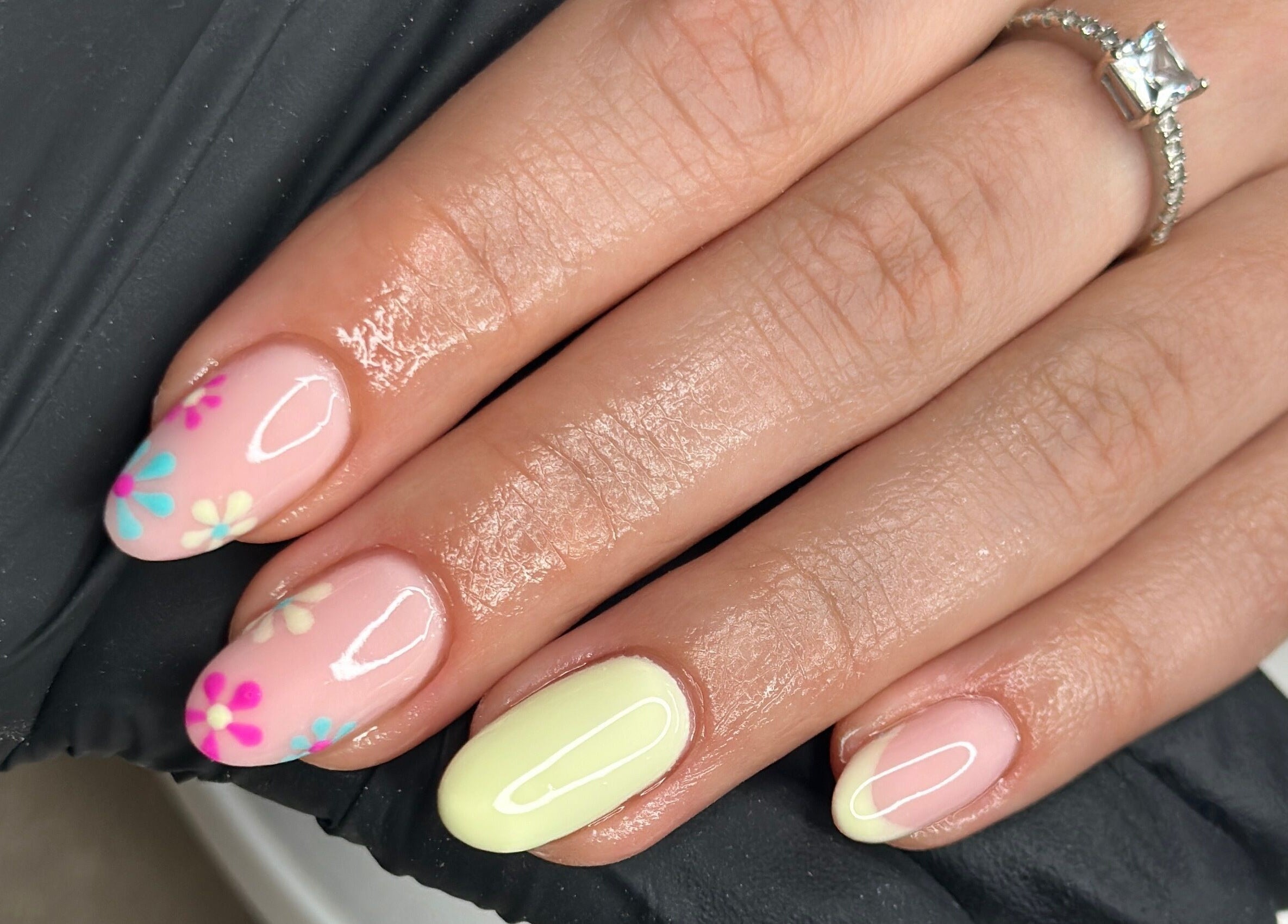 Floral nail art manicure at Livin Beauty Lounge, Purton, England, GB, showcasing delicate and vibrant designs.