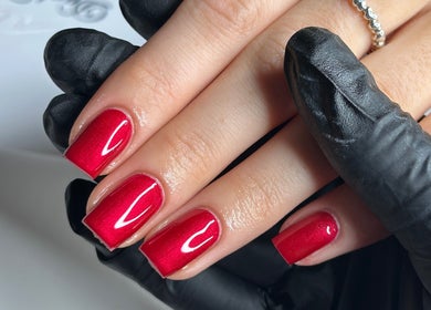 Red manicured nails at Livin Beauty Lounge, Purton, England, GB.