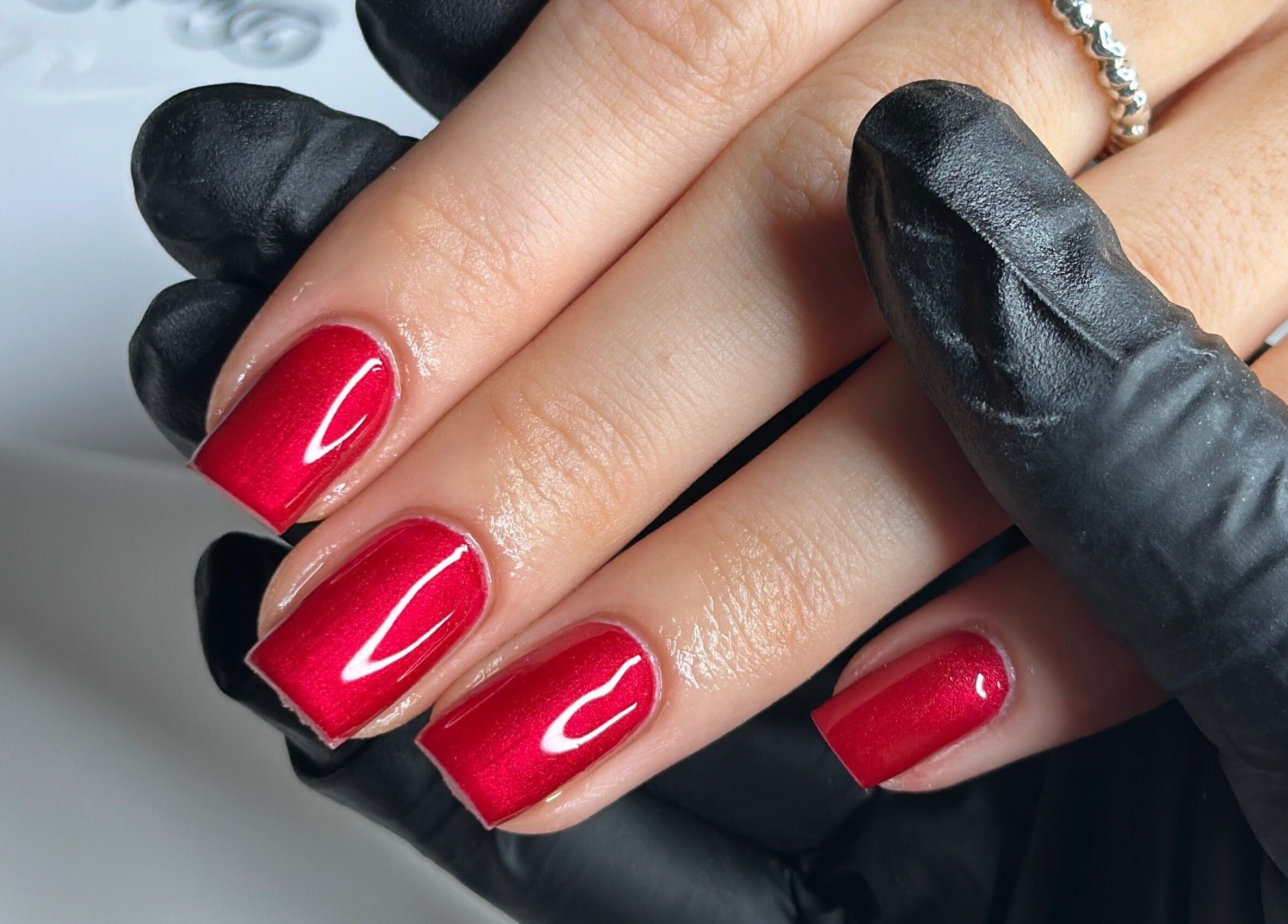Red manicured nails at Livin Beauty Lounge, Purton, England, GB.