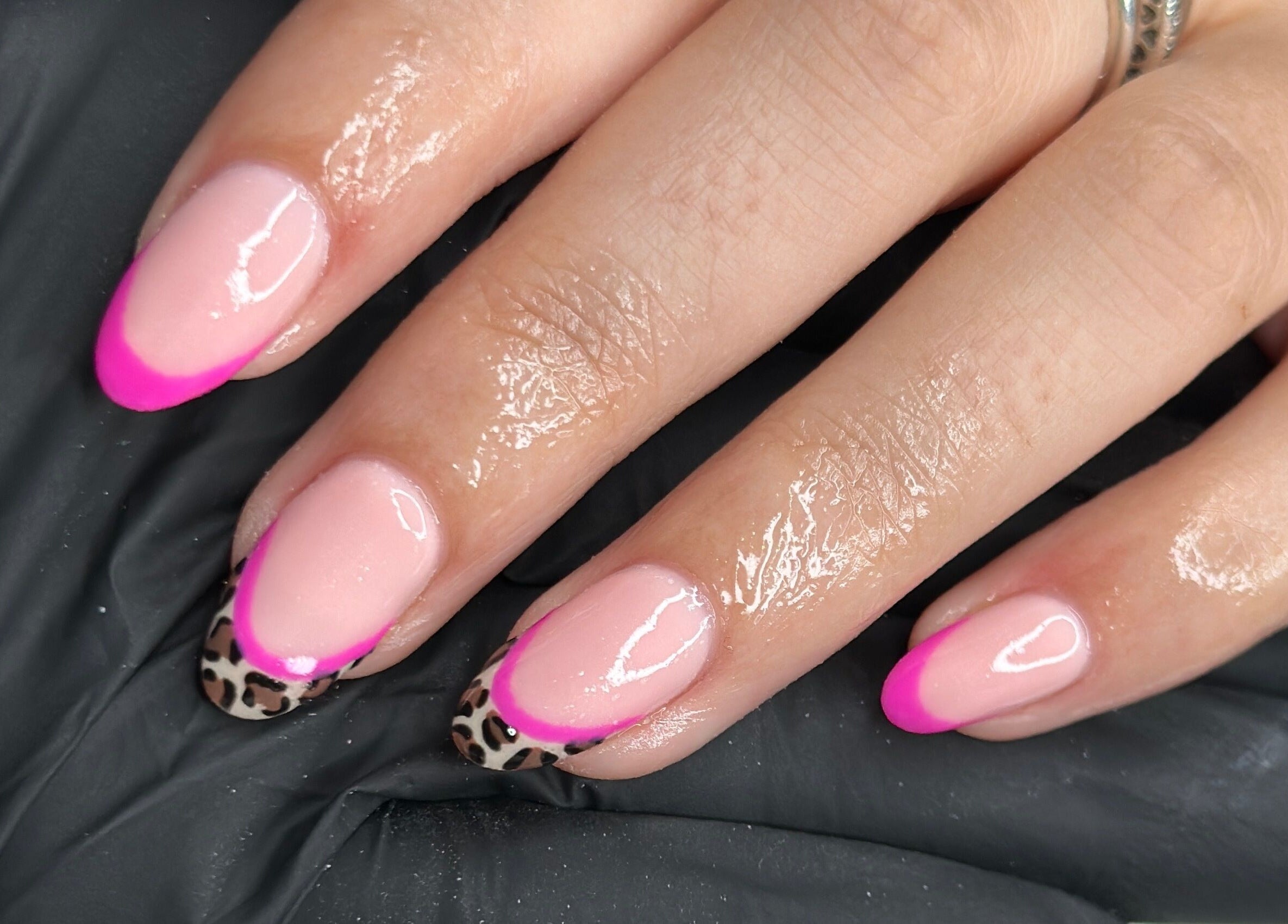 Stylish pink and leopard nail art at Livin Beauty Lounge, Purton, England, GB.